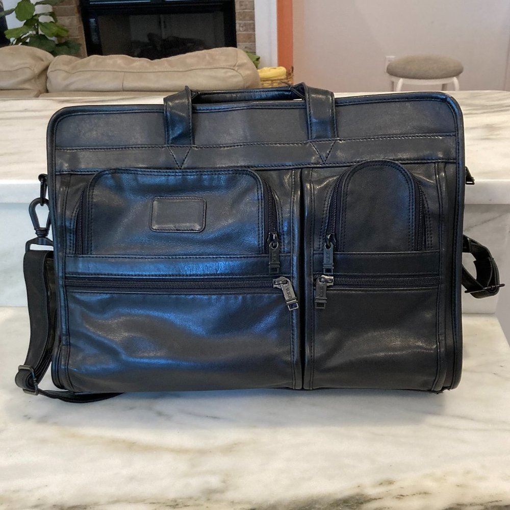 Tumi black leather briefcase, 17"X 13"X 5"
